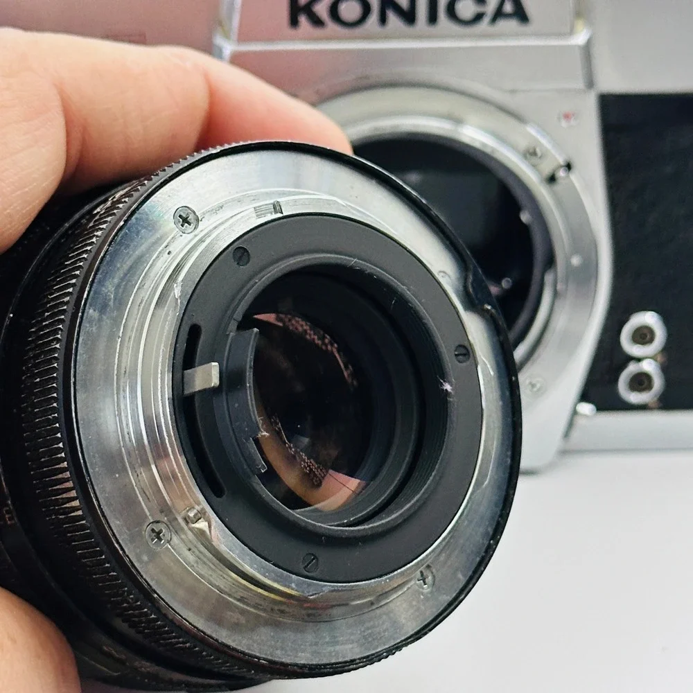 Konica Autoreflex T 35mm SLR Film Camera with Soligor Lens Silver Black UNTESTED